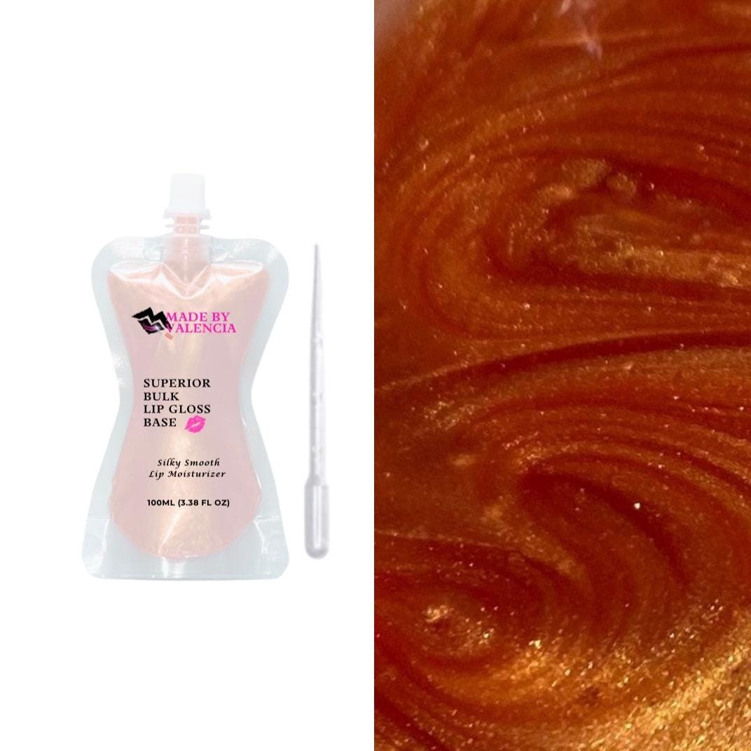 Professional Versagel wholesale bulk lip gloss. Orange lip balm consistency made with high quality ingredients. Non-sticky & moisturizing.
