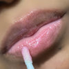 red pink lip gloss swatch